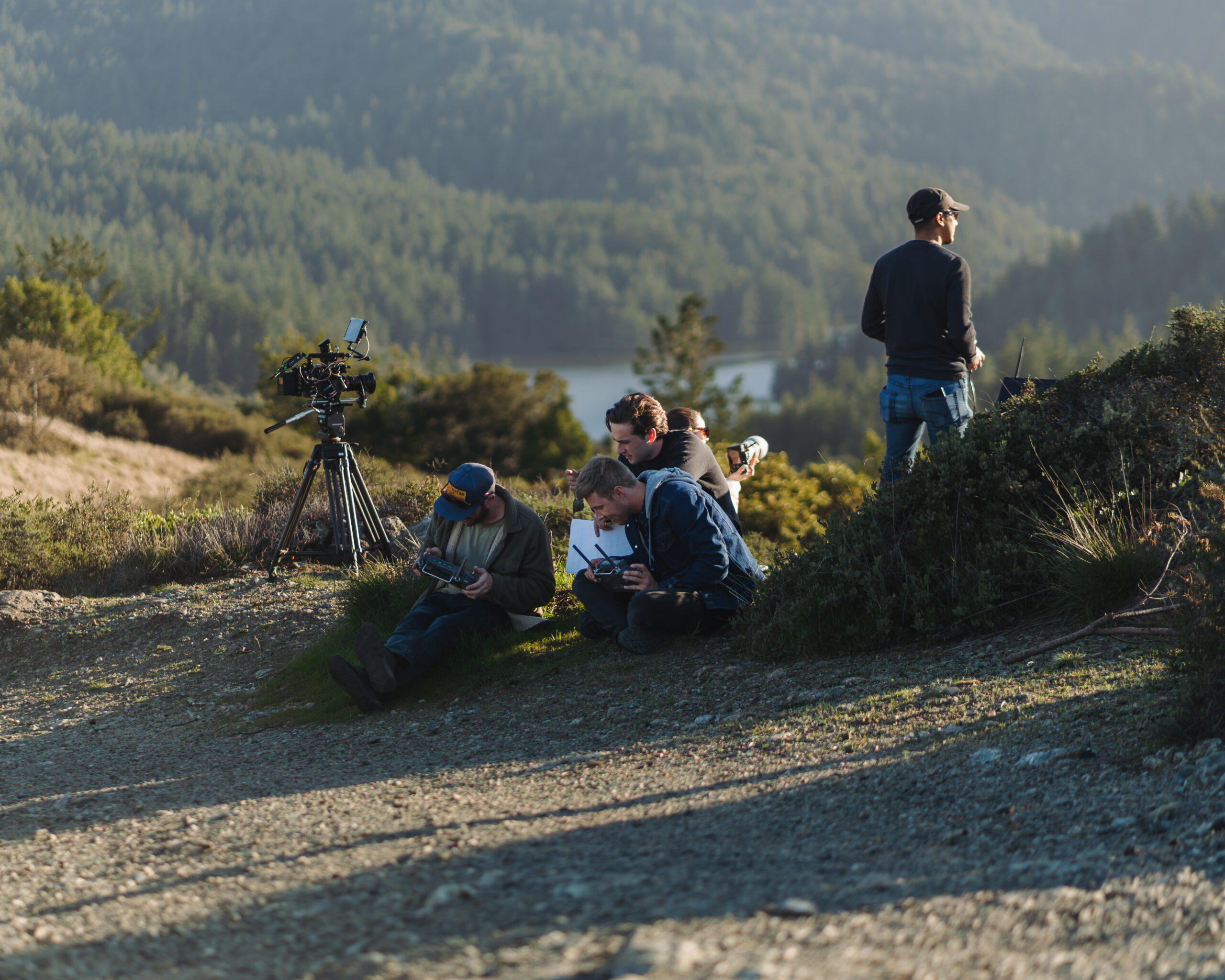 SiFly 1 Behind-the-scenes view of our product launch video services production crew operating drones and cameras in a scenic outdoor location.