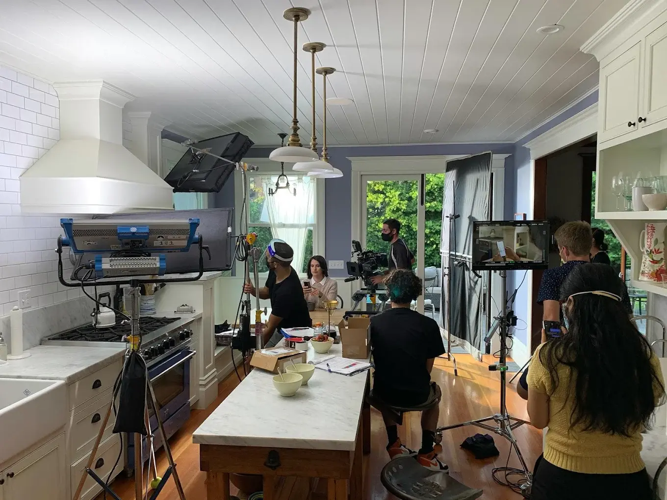 Luma Creative production team working on set