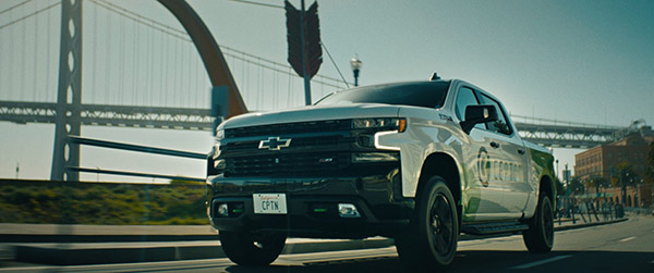 Chevy Silverado with Cepton lidar branding driving along the Embarcadero with the Bay Bridge behind it, frame from Cepton’s brand video by Luma Creative