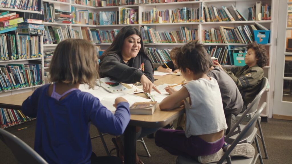 Vanessa mentoring children during a Boys & Girls Club of Santa Cruz nonprofit video produced by Luma Creative.